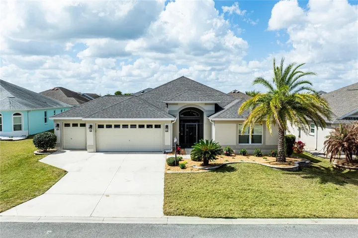 Beautiful Zinnia Model with golf cart garage and a pool.