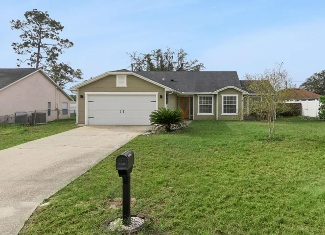 Front of home sitting on .23 acres