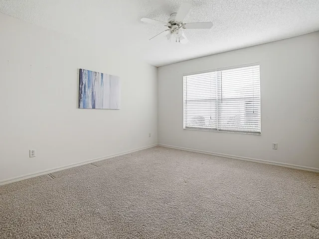 Guest bedroom #2 with double door closet