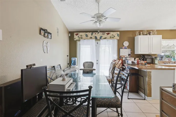 Dining room open to kitchen at dright