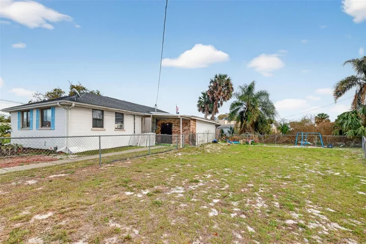 Rear of property with separate fenced area