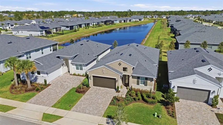 Arial view of property and pond.