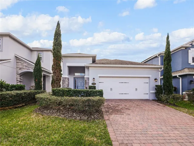 Front of House with Paver Driveway