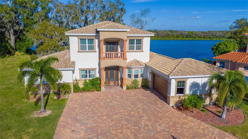 Front elevation, shows lake view from home.