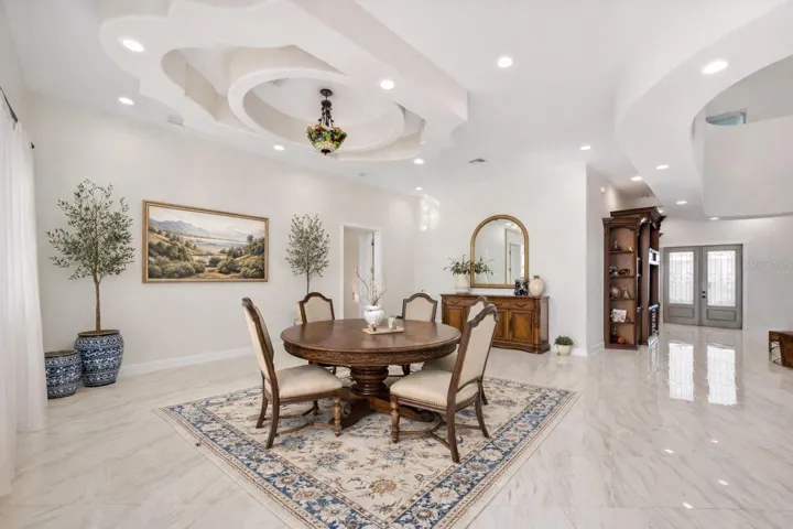 Dining room - Virtual staging added to demonstrate possible furniture placement.