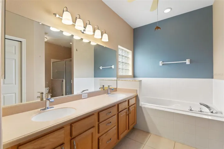 Private bath from primary en suite bedroom