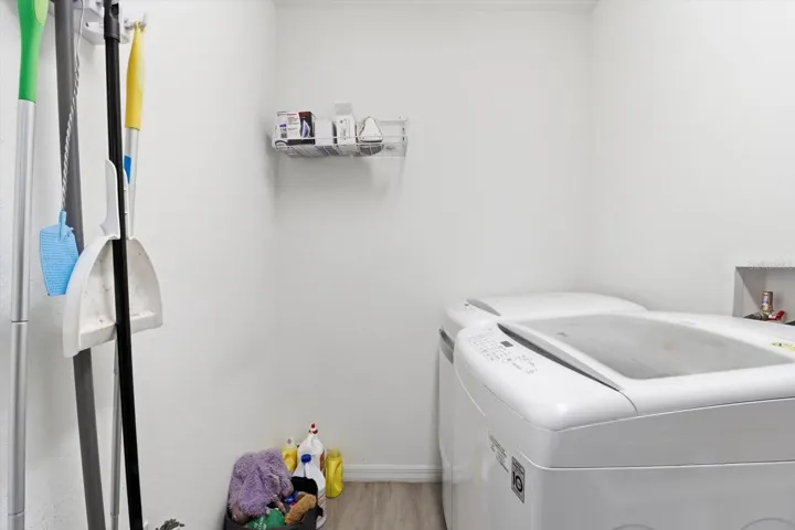 Laundry room comes with washer and dryer.