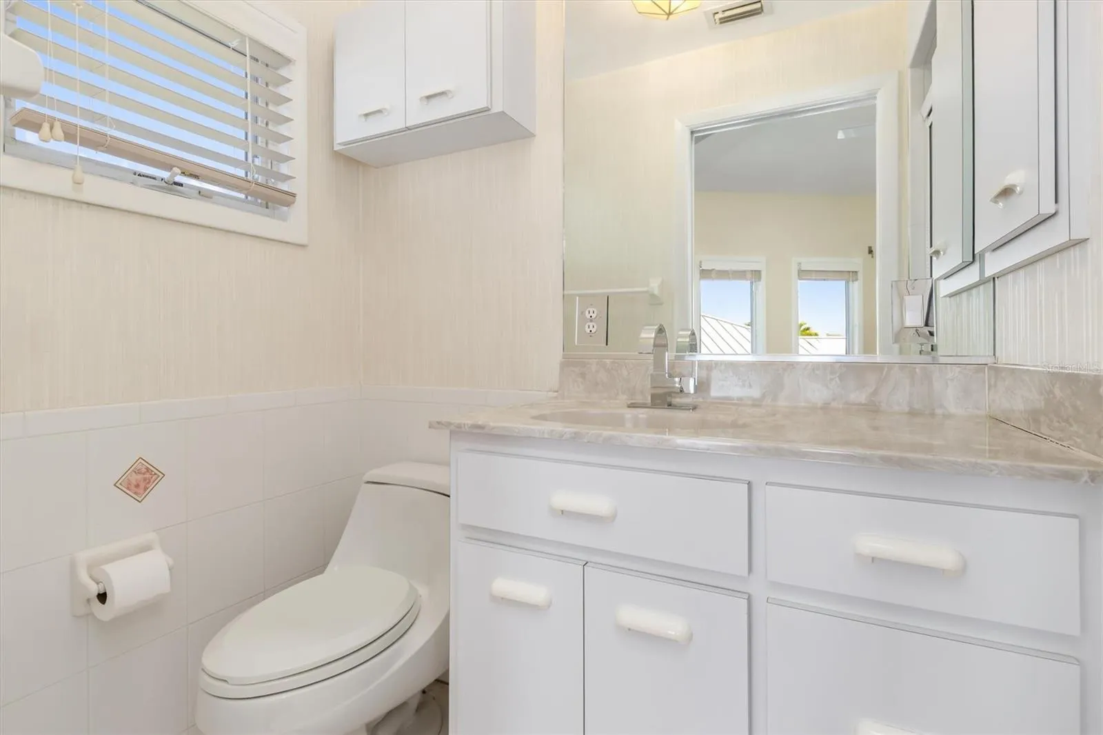 Bathroom 4 - Updated Cabinets, granite counter tops and faucet