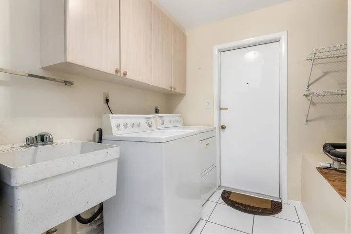 Laundry Room - Washer/Dryer, custom cabinets and wash tub