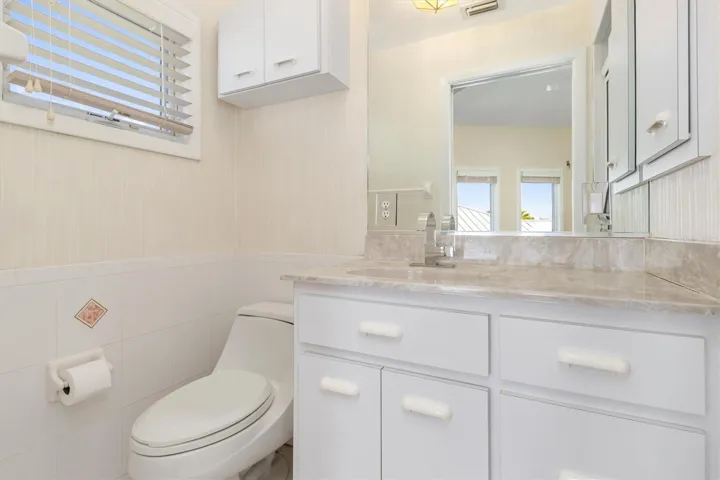 Bathroom 4 - Updated Cabinets, granite counter tops and faucet