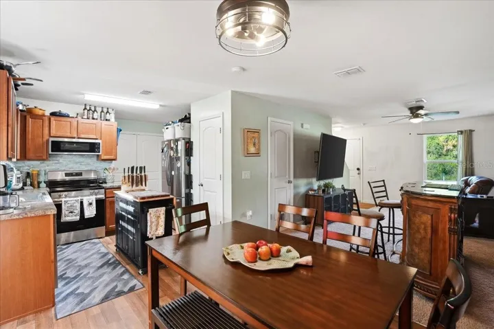 Dining room facing the kitchen and living area
