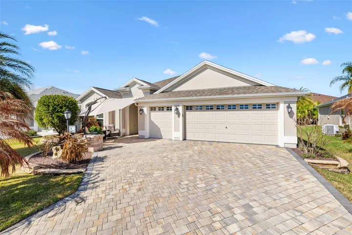 Beautiful paver driveway and walkway really showcases the front of the home!