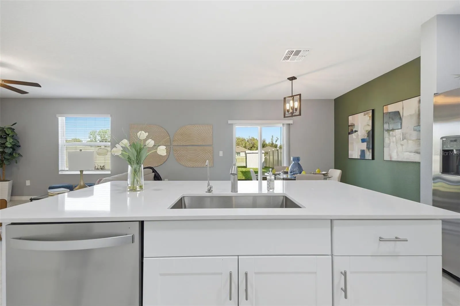 Oversized island with view of dining room