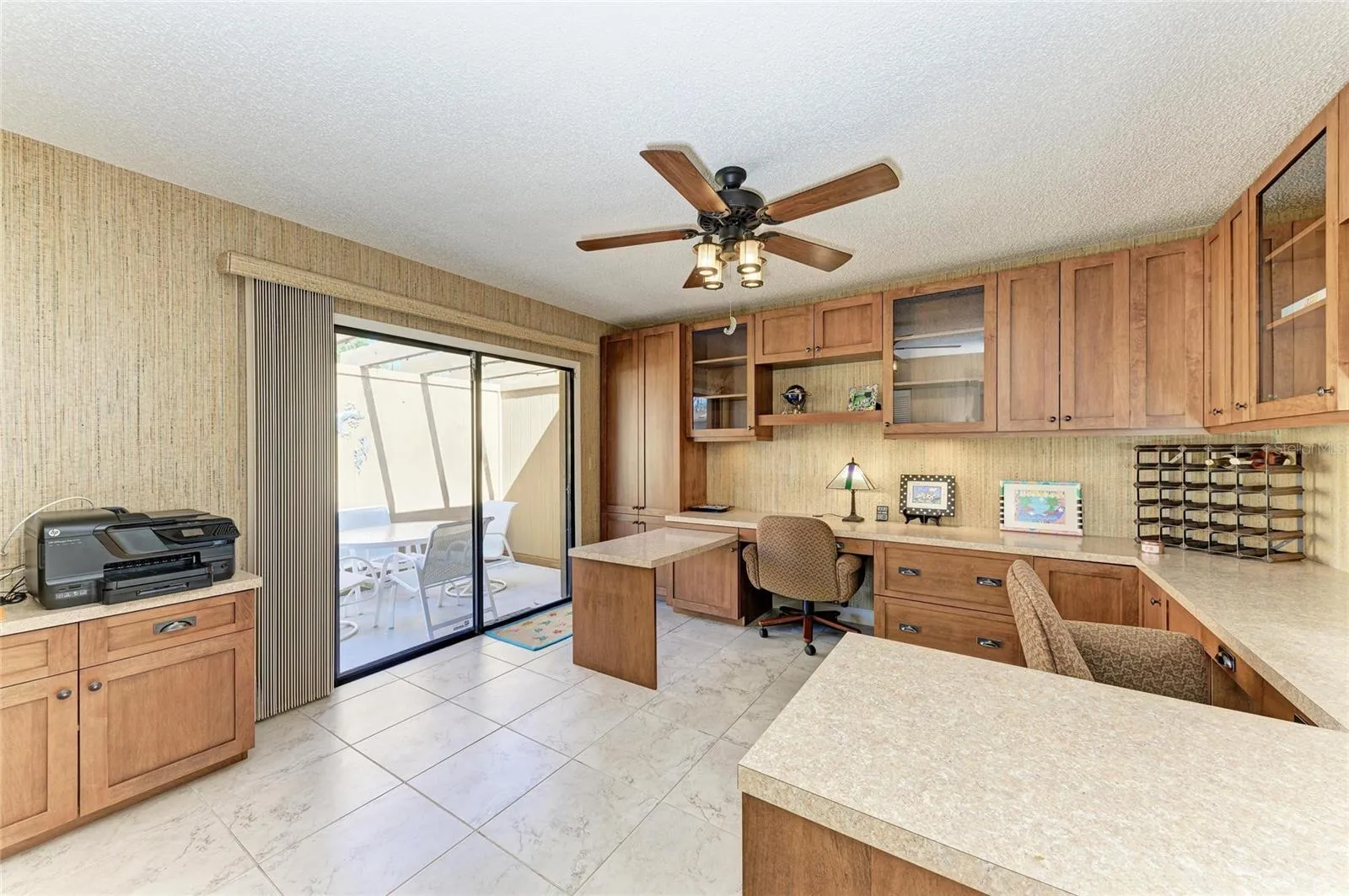 3rd bedroom with built in desk with lanai.
