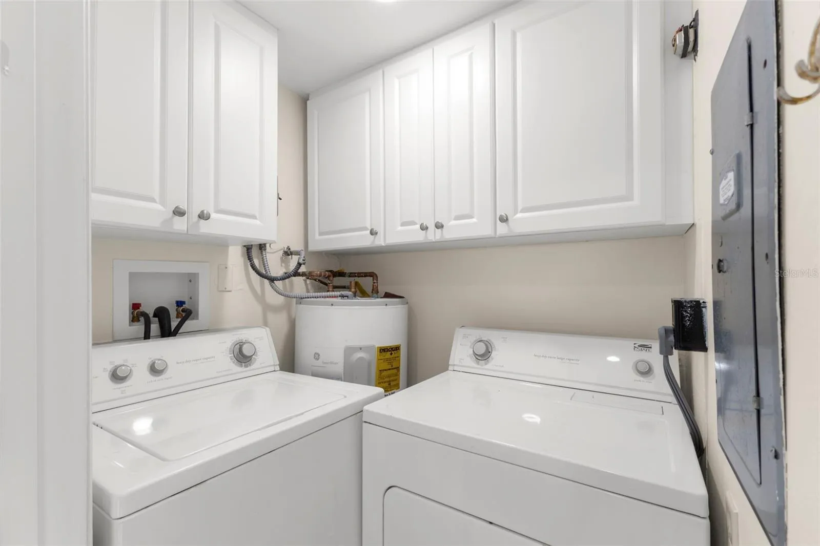 INSIDE LAUNDRY ROOM OFF OF KITCHEN