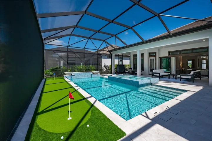 Putting Green and Oversized Pool & Spa