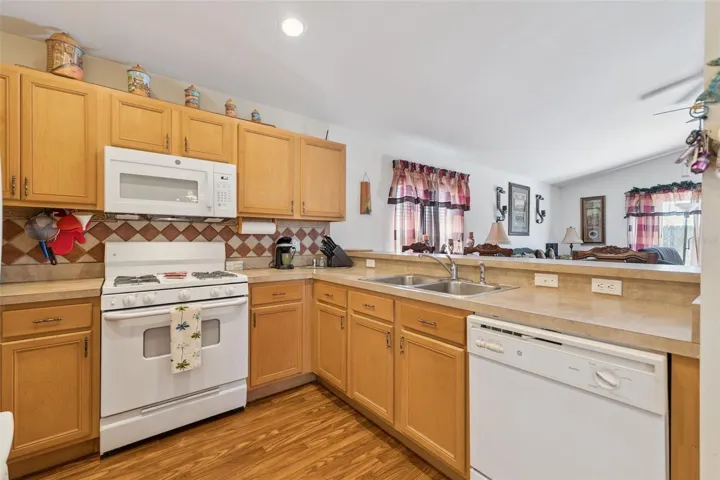 Eat in Kitchen features a gas range