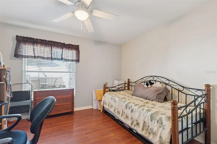 Bedroom #2 features wood laminate flooring