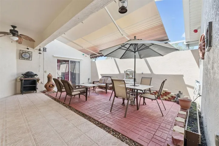 Courtyard Features a retractable awning and water fountain
