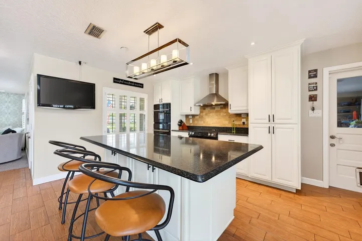 A generous center island offers extra prep space and room for counter-height seating.