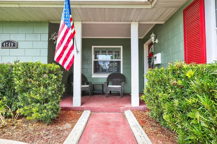 This home is perfectly situated on a corner lot and offers your own private pool oasis.