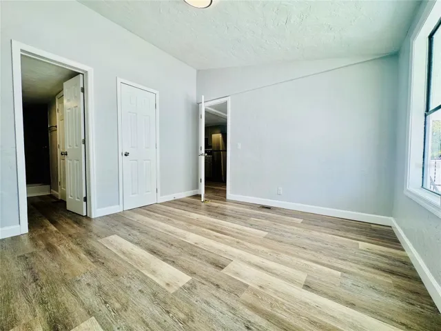 Primary bedroom off of dining room