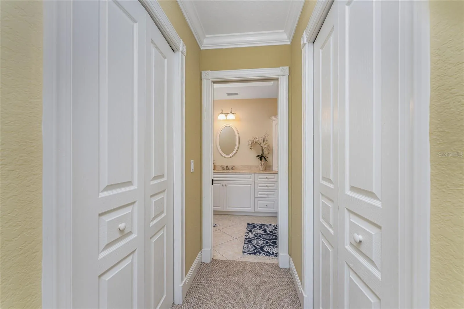 Spacious closet design with wood shelves- walk in closet