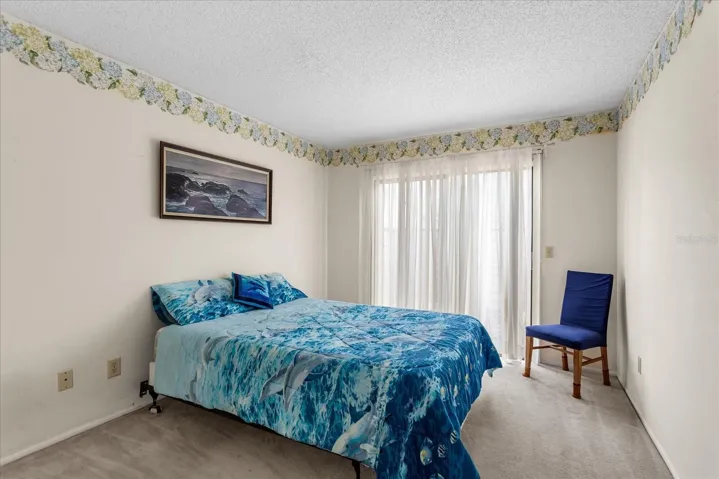 Bedroom 3 opens to front enclosed courtyard