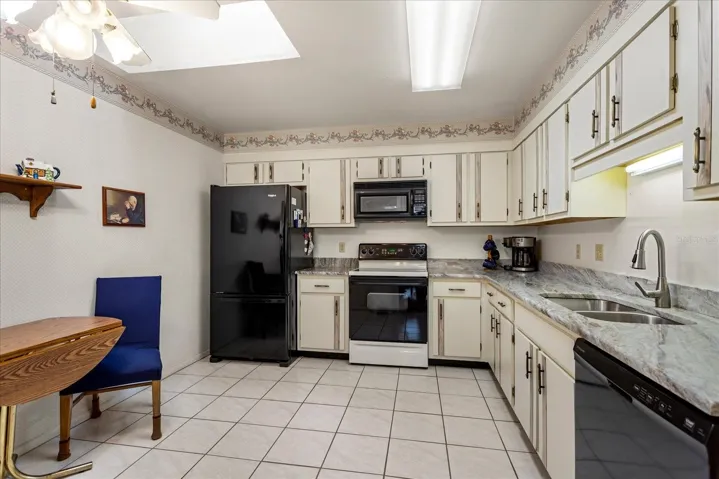 Updated refrigerator, dishwasher, sinks, disposal and granite counter tops