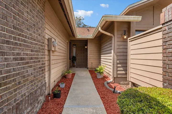 Front entry with enclosed courtyard to the right