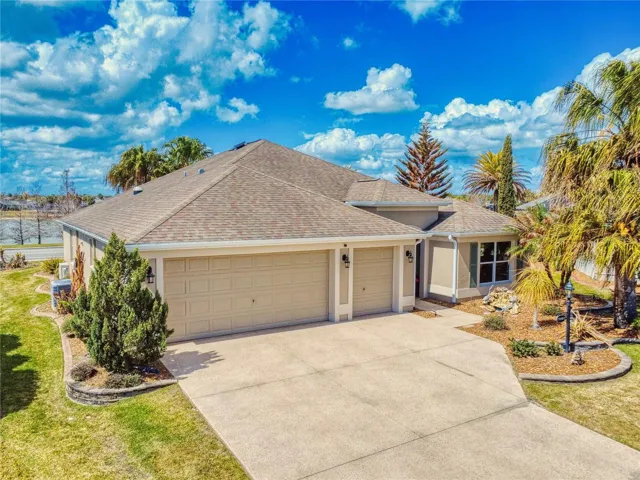 LOVELY 3/2 IRIS DESIGNER WITH WATER VIEW IN THE VILLAGE OF SANIBEL.