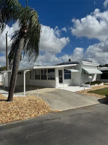Exterior Front & Carport