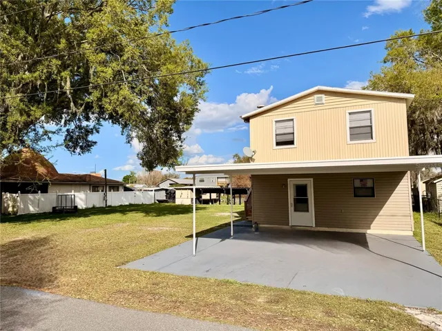 2 car carport and spacious yard