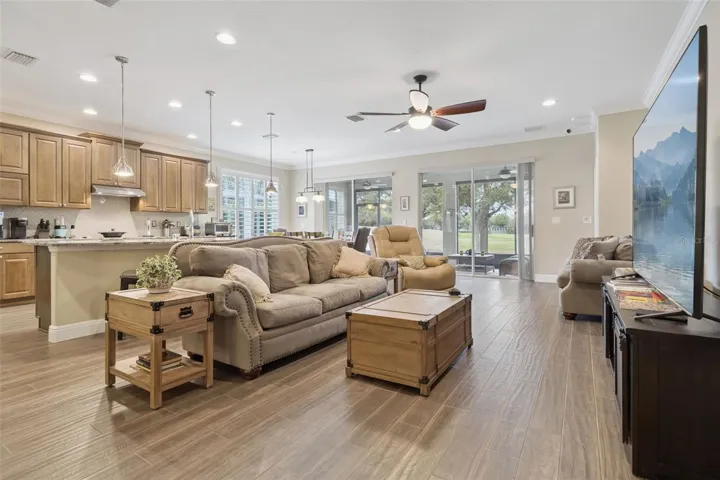 Open plan living at it's finest. Note the porcelain tile that runs throughout the home.