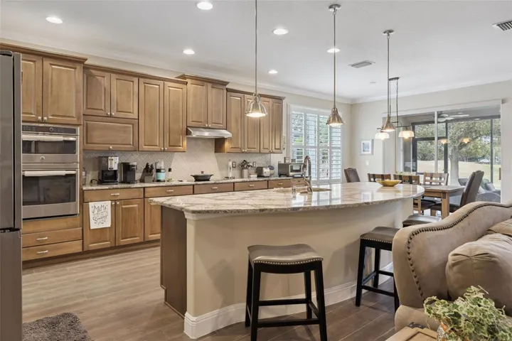 42" upper cabinets that are 15" deep to accomodate large crockery and cookware.