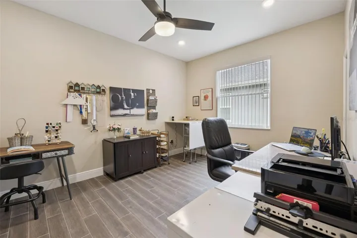 Additional lighting in this bedroom creates a great hobby room.