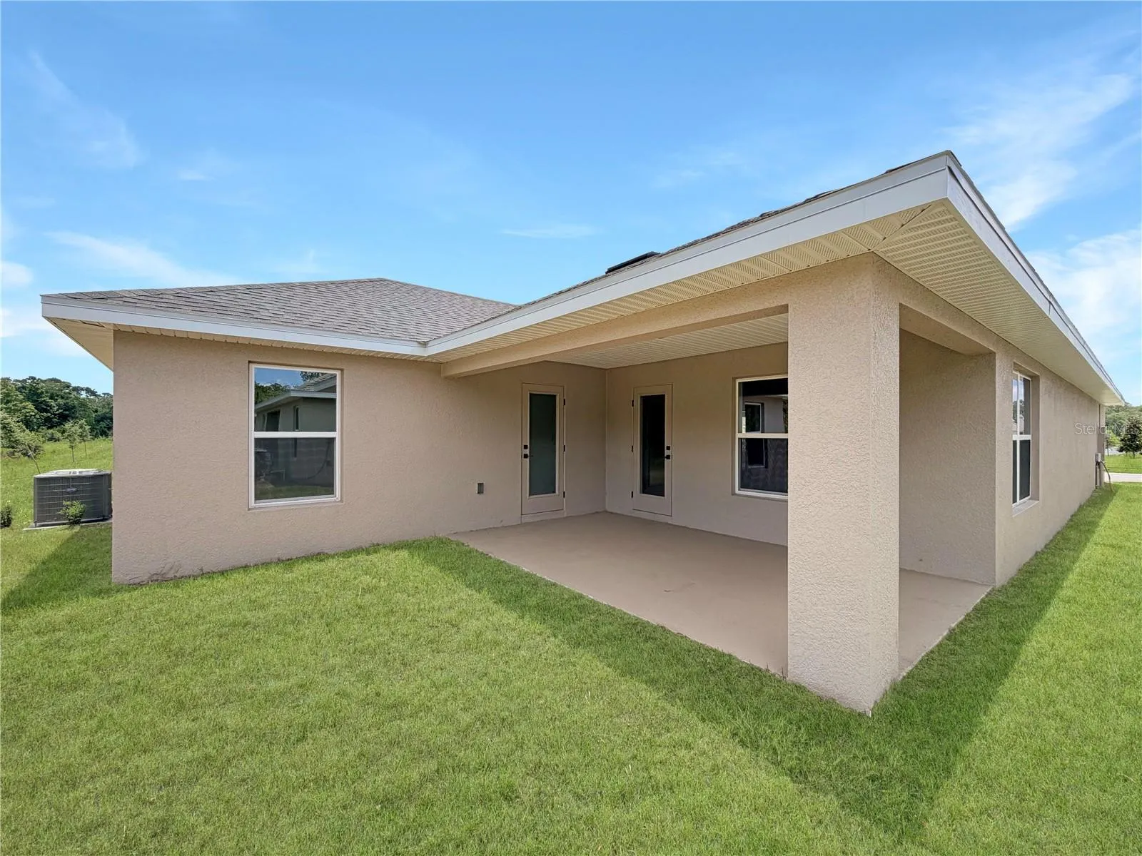 Covered Lanai and access from the Living room or Owner suite