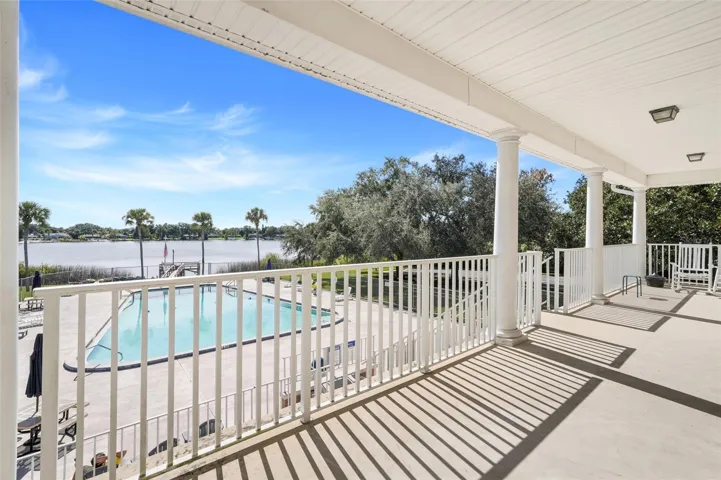 Back porch of Clubhouse patio overlooking pool and Lake Giles