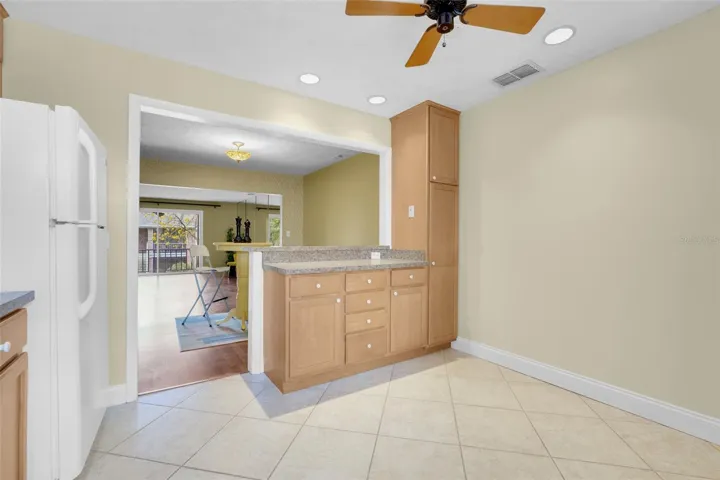 Inside kitchen looking to dining room/living room and patio