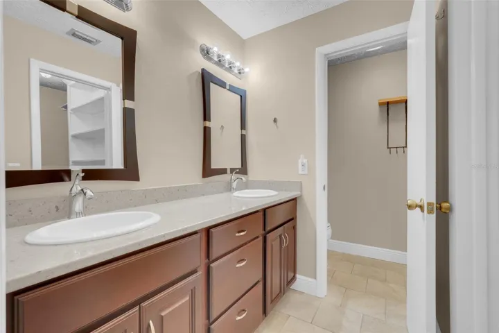 Vanity area in primary bathroom