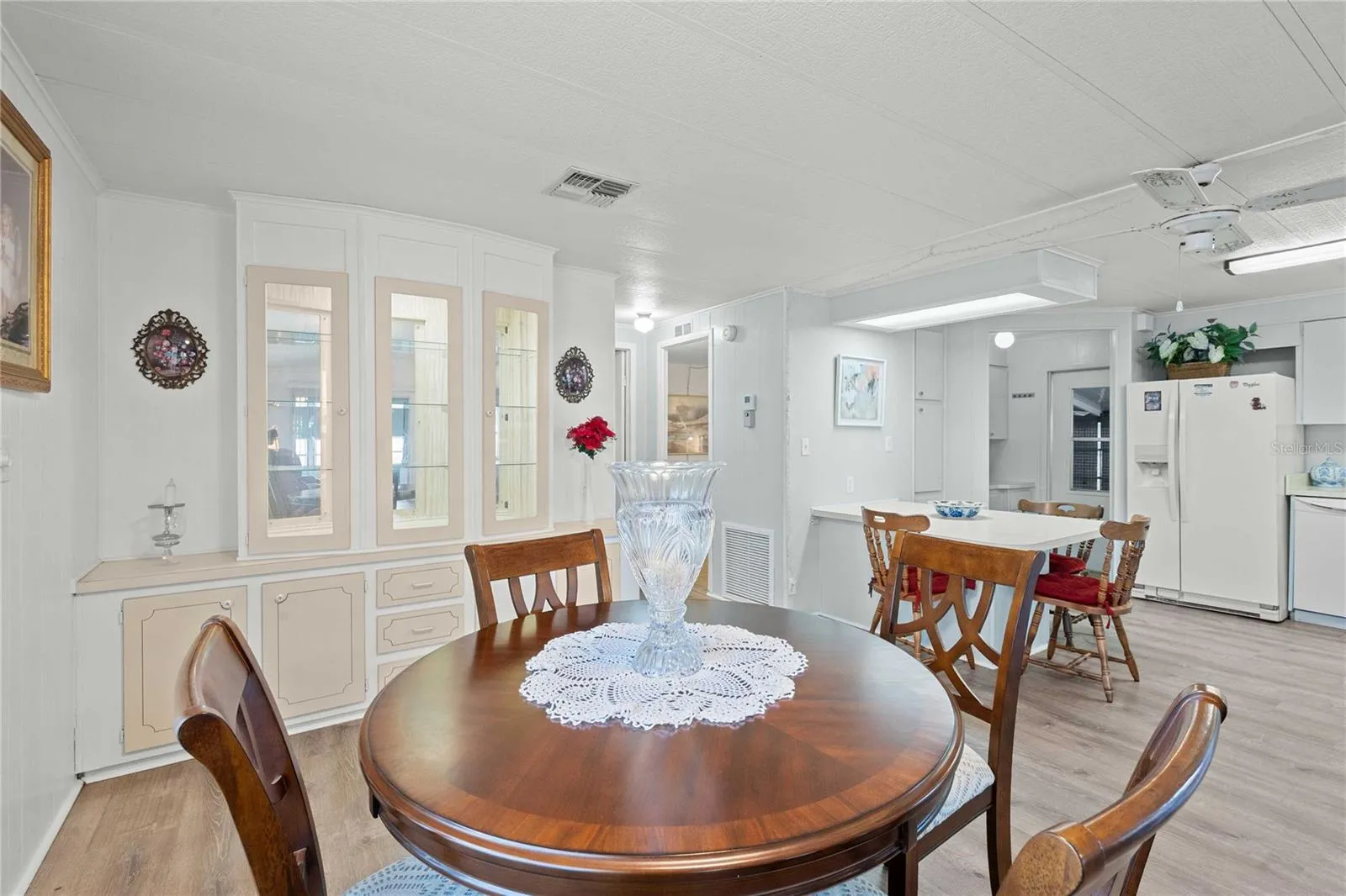 Dining area is open with living room and kitchen.