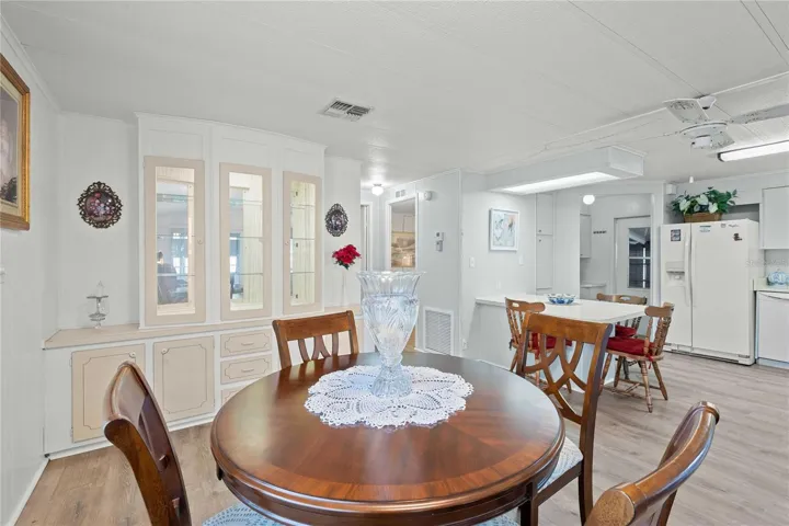 Dining area is open with living room and kitchen.