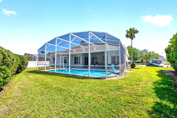 The spacious yard provides additional room to enjoy the outdoors.