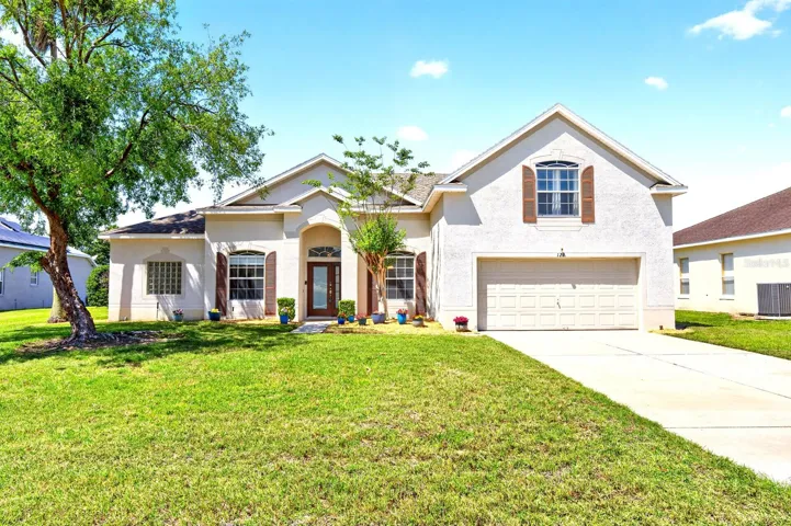 Welcome to this BEAUTIFULLY UPDATED 5-bedroom, 4-bath POOL HOME in the desirable Hampton Lakes community, offering over 2,800 SQUARE FEET of versatile living space on an OVERSIZED CUL-DE-SAC LOT.