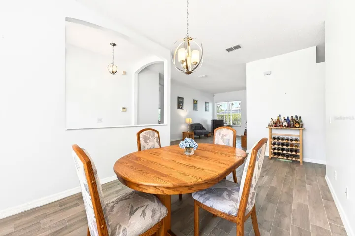 Inside, a separate Living Room and Dining Room provide ELEGANT SPACES for entertaining.