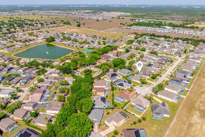 Aerial view of the home and community.
