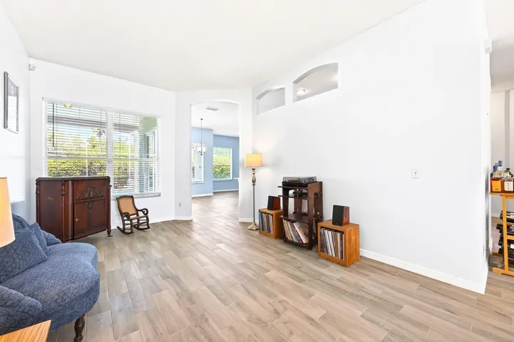 Inside, a separate Living Room and Dining Room provide ELEGANT SPACES for entertaining.
