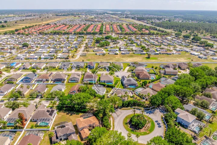 Aerial view of the home and community.