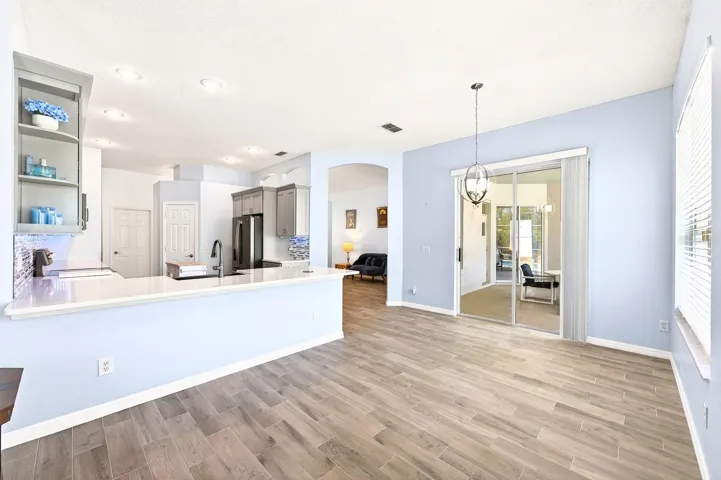A generous Breakfast bar offers prep space and room for counter-height seating.