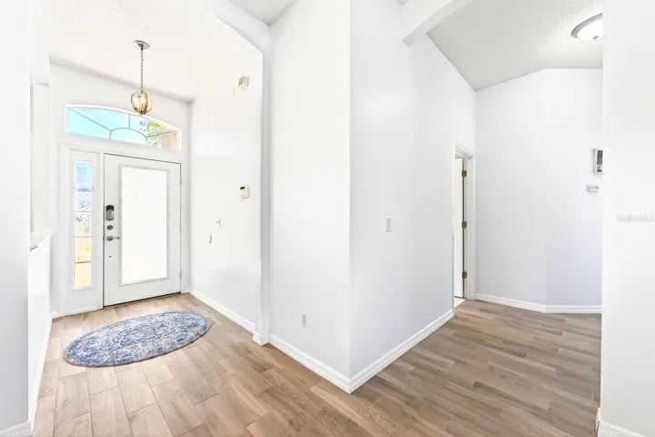 From the moment you arrive, you’ll appreciate the home’s thoughtful ARCHITECTURAL DESIGN, highlighted by arched doorways and decorative cutouts that add character throughout.